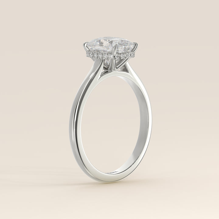 Mikki - Elongated Cushion Solitair Lab Grown Diamond Ring with Cathedral Setting and Wrap Around Halo
