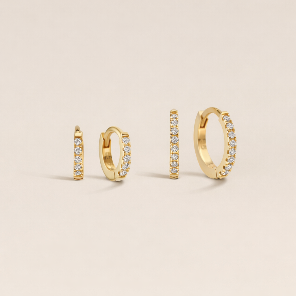 Gouden oorbellen huggies met lab grown diamanten stenen