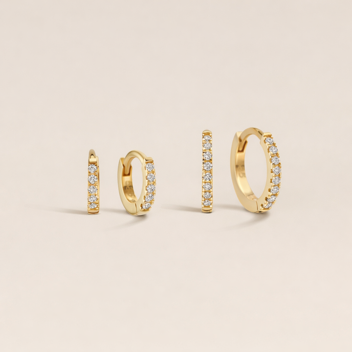 Gouden oorbellen huggies met lab grown diamanten stenen