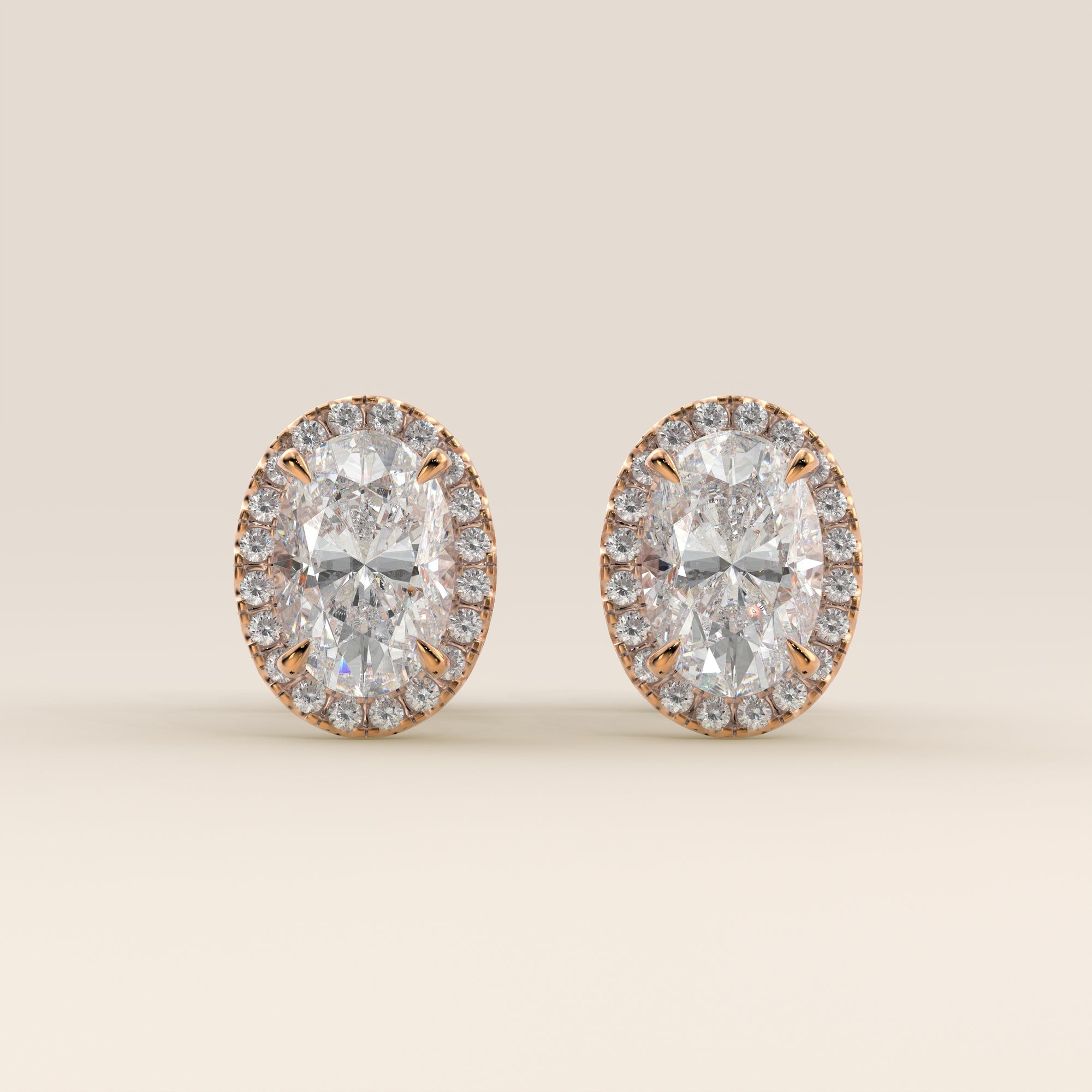 Boucles d'oreilles puces serties d'un halo de diamants ovales de laboratoire, or rose
