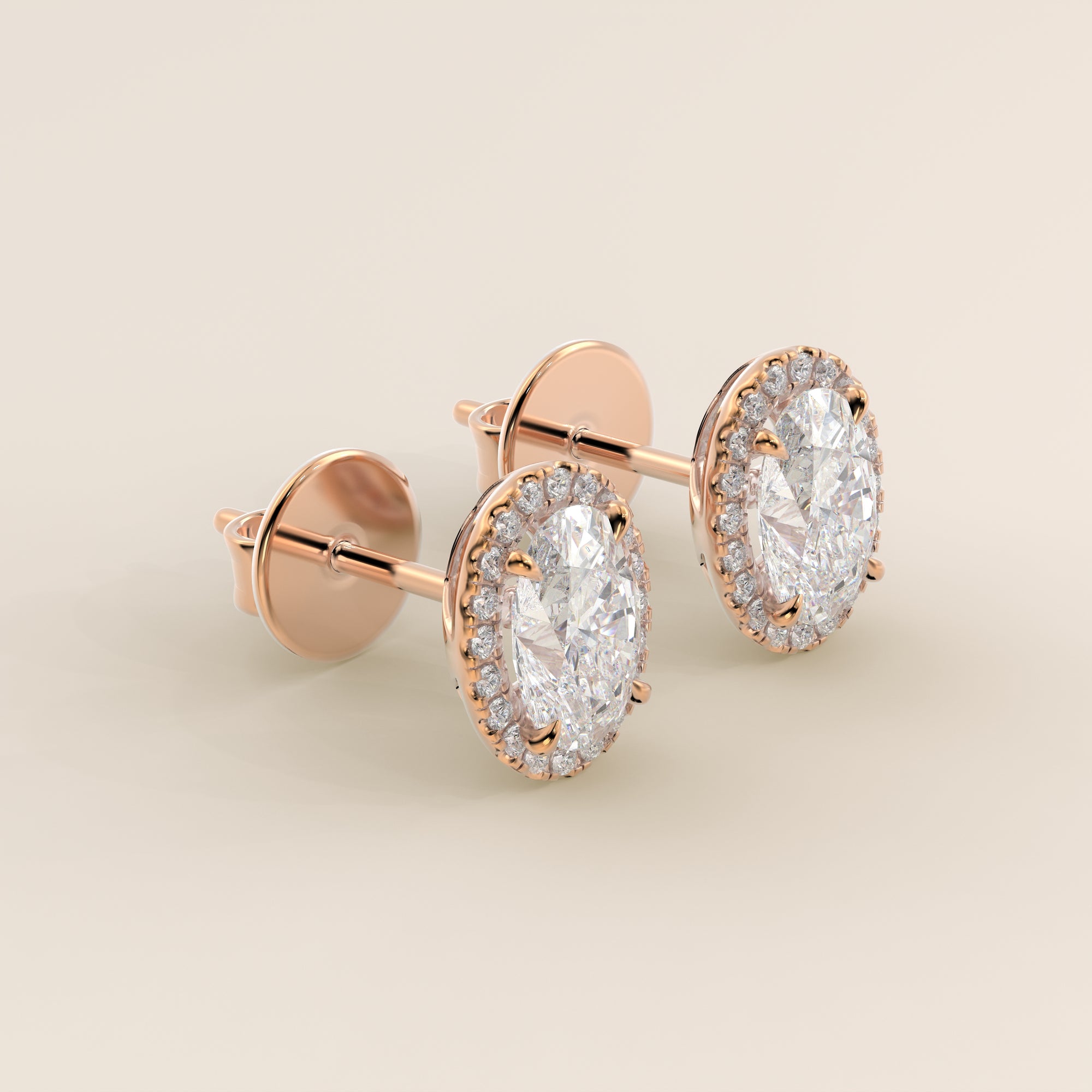 Boucles d'oreilles puces serties d'un halo de diamants ovales de laboratoire, or rose