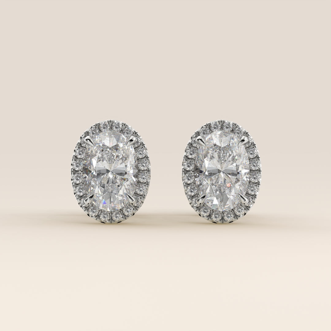 Boucles d'oreilles puces serties d'un diamant ovale de laboratoire, or blanc