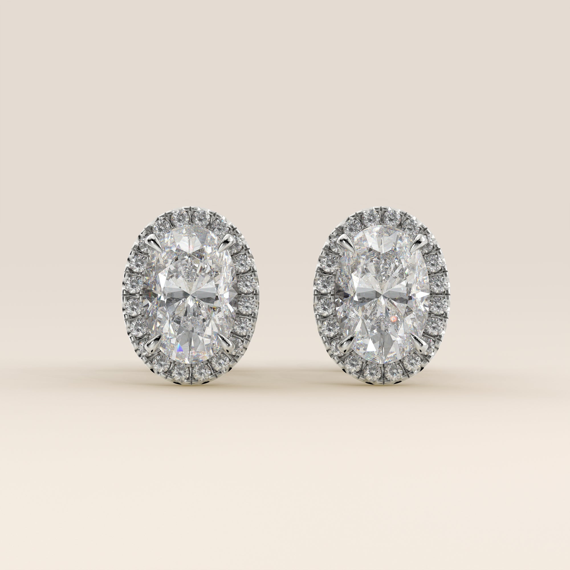 Boucles d'oreilles puces serties d'un diamant ovale de laboratoire, or blanc