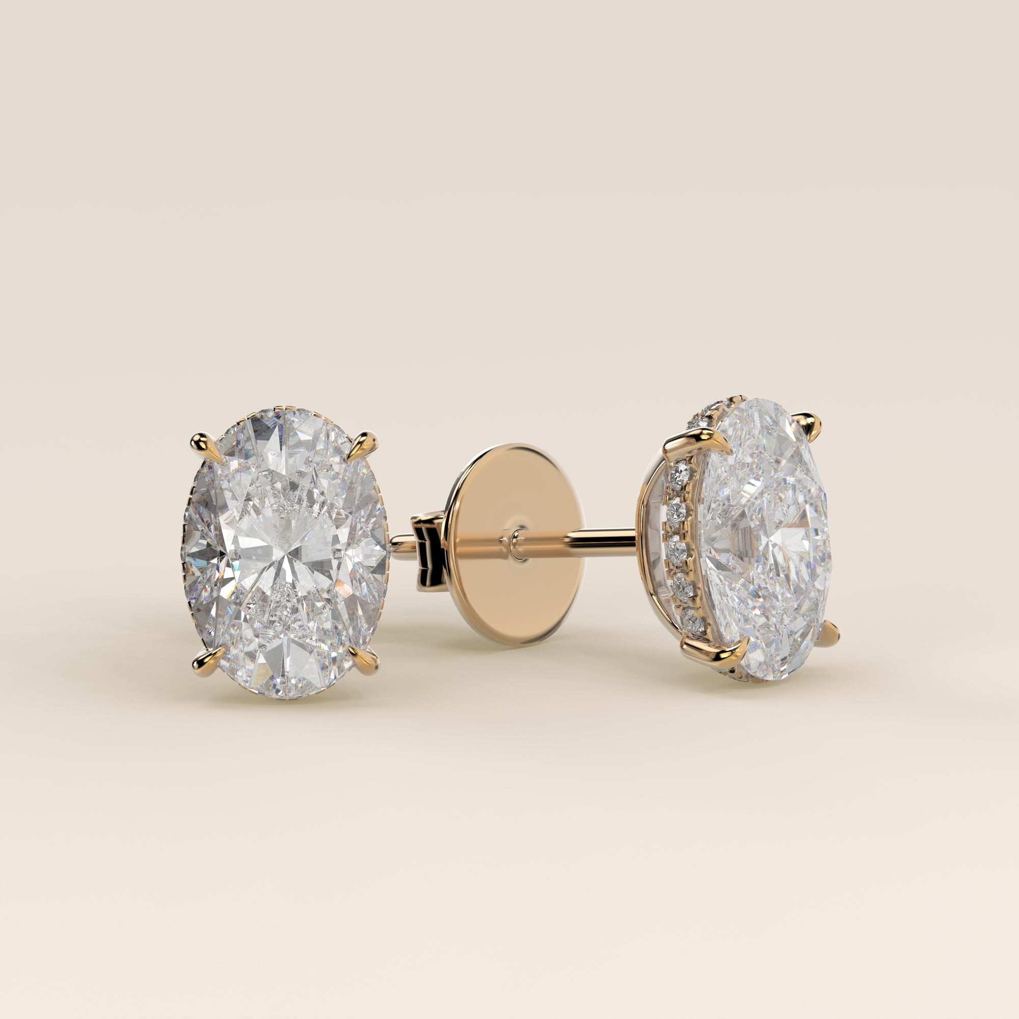 Stud oorbellen ovaal lab grown diamant met hidden halo, geelgoud