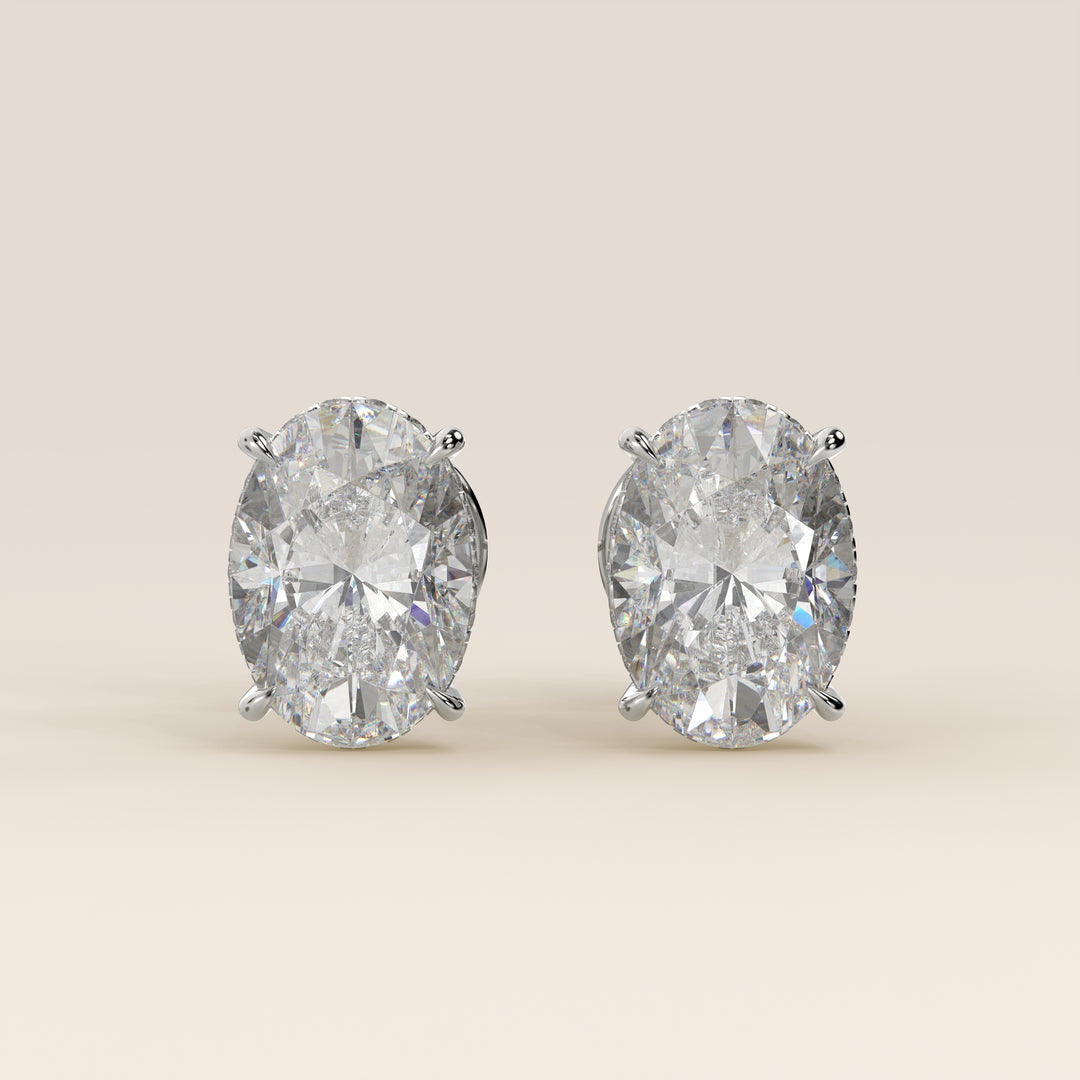 Stud oorbellen ovaal lab grown diamant met hidden halo, witgoud