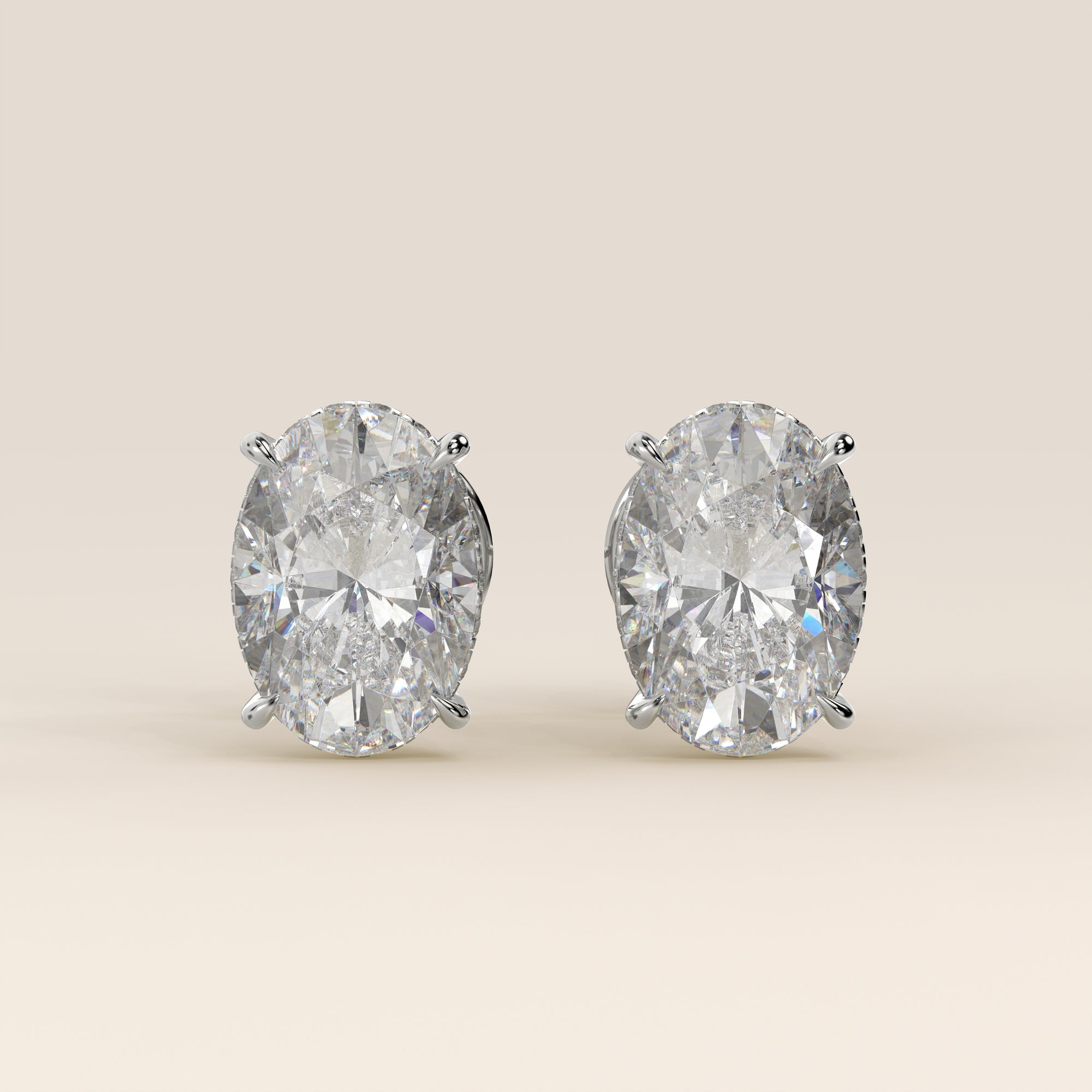 Stud oorbellen ovaal lab grown diamant met hidden halo, witgoud