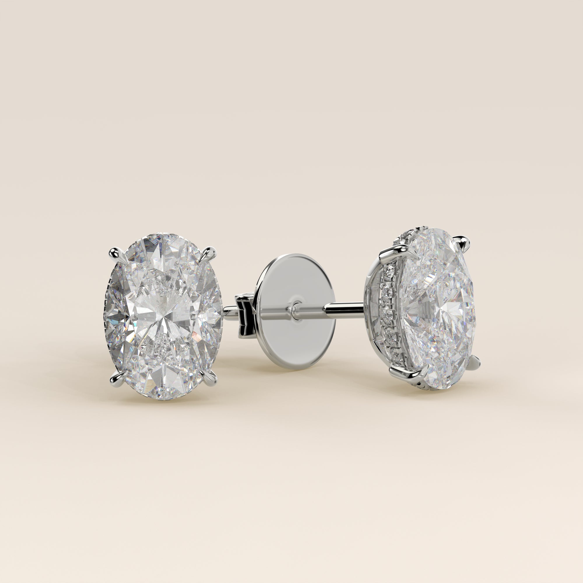 Stud oorbellen ovaal lab grown diamant met hidden halo, witgoud