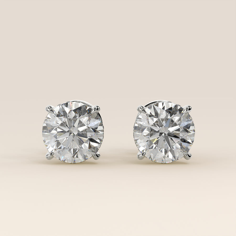 Stud oorbellen rond lab grown diamant met hidden halo, witgoud