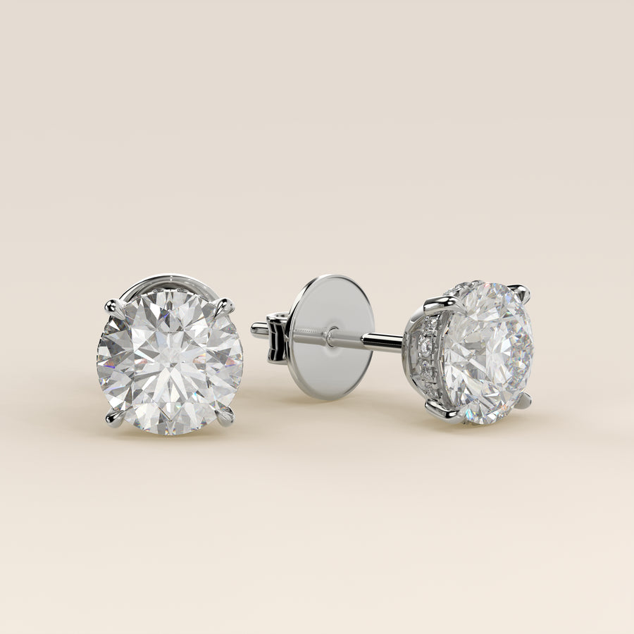 Stud oorbellen rond lab grown diamant met hidden halo, witgoud
