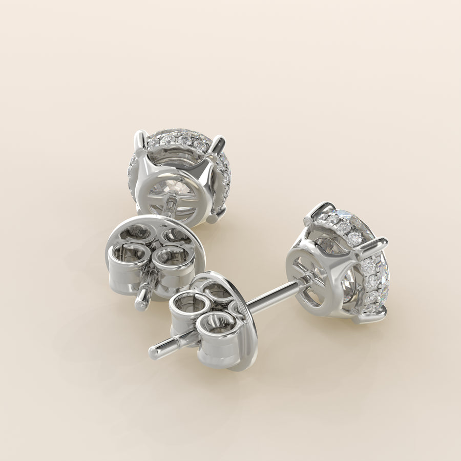 Stud oorbellen rond lab grown diamant met hidden halo, witgoud