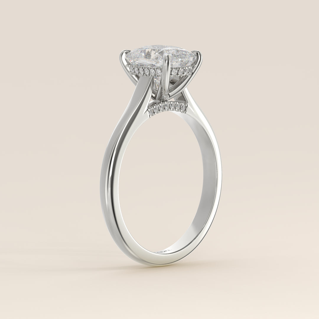 Verlovingsring elongated cushion lab grown diamant met cathedral setting, hidden halo en diamond bridge, witgoud