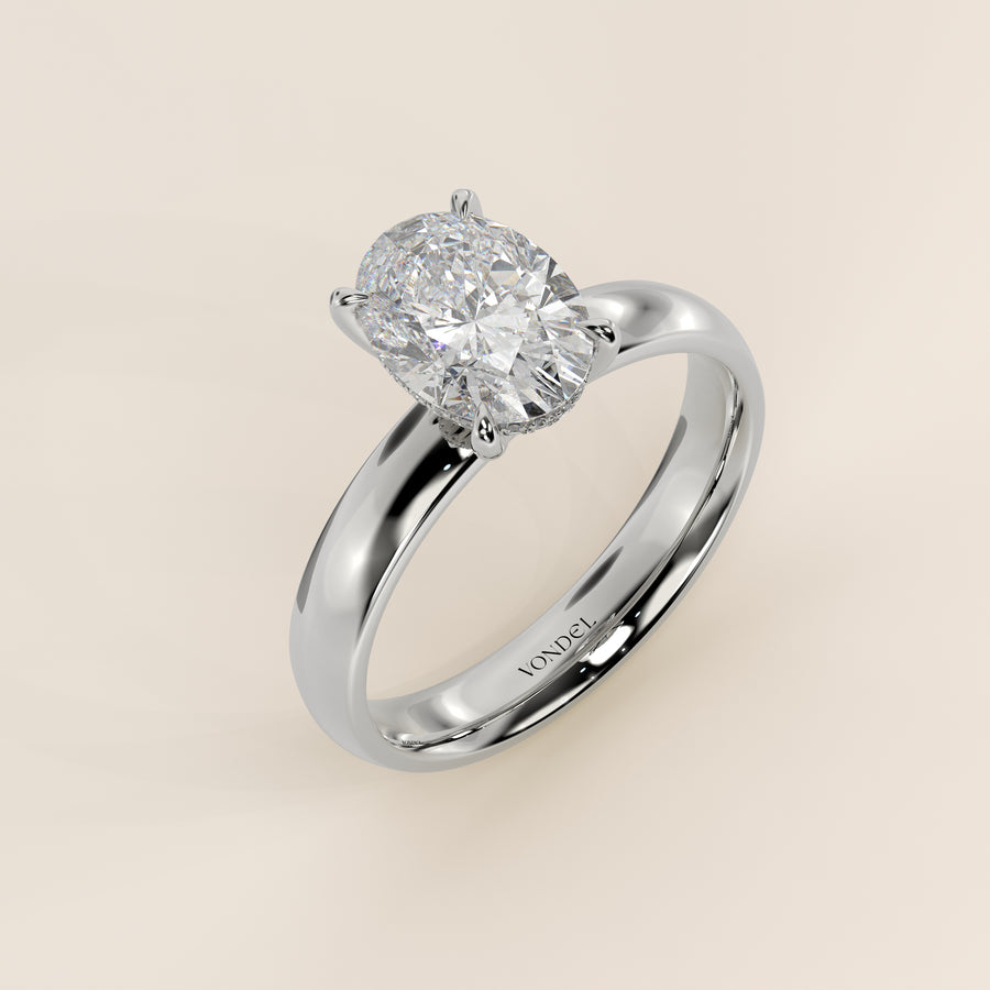Verlovingsring ovaal lab grown diamant met brede band en hidden halo, witgoud