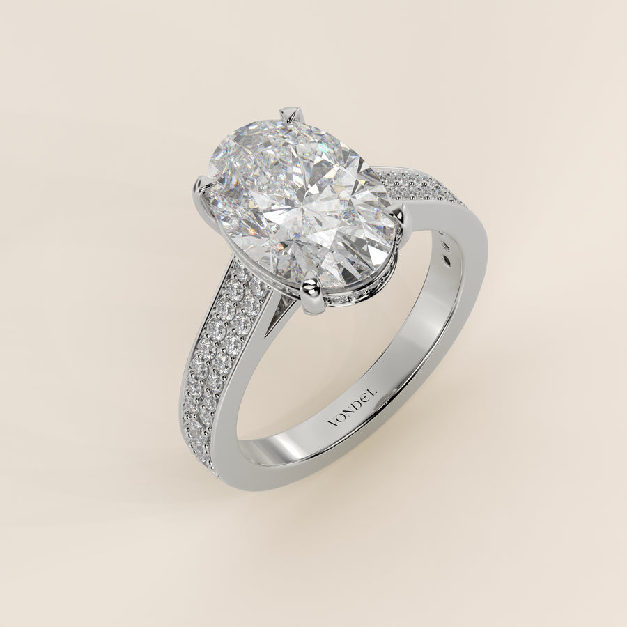 Verlovingsring ovaal lab grown diamant met brede pave band, cathedral setting en hidden halo, witgoud