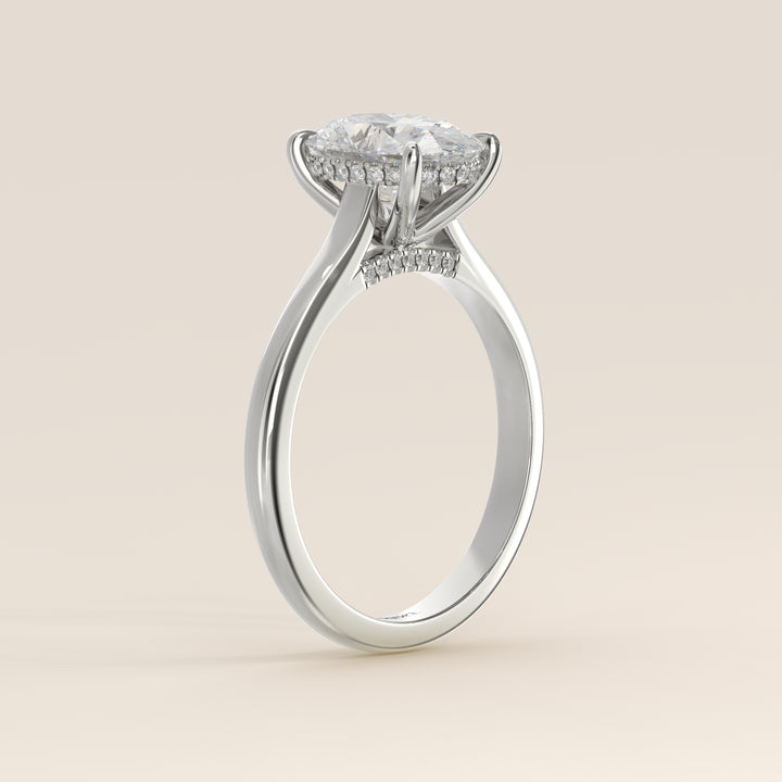 Verlovingsring ovaal lab grown diamant met cathedral setting, hidden halo en diamond bridge, witgoud