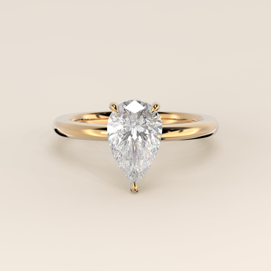 Verlobungsring mit birnenförmigem, im Labor gezüchtetem Diamanten, Gelbgold