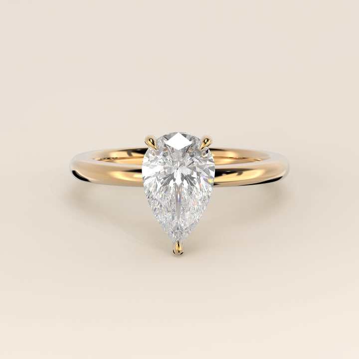 Verlobungsring mit birnenförmigem, im Labor gezüchtetem Diamanten, Gelbgold