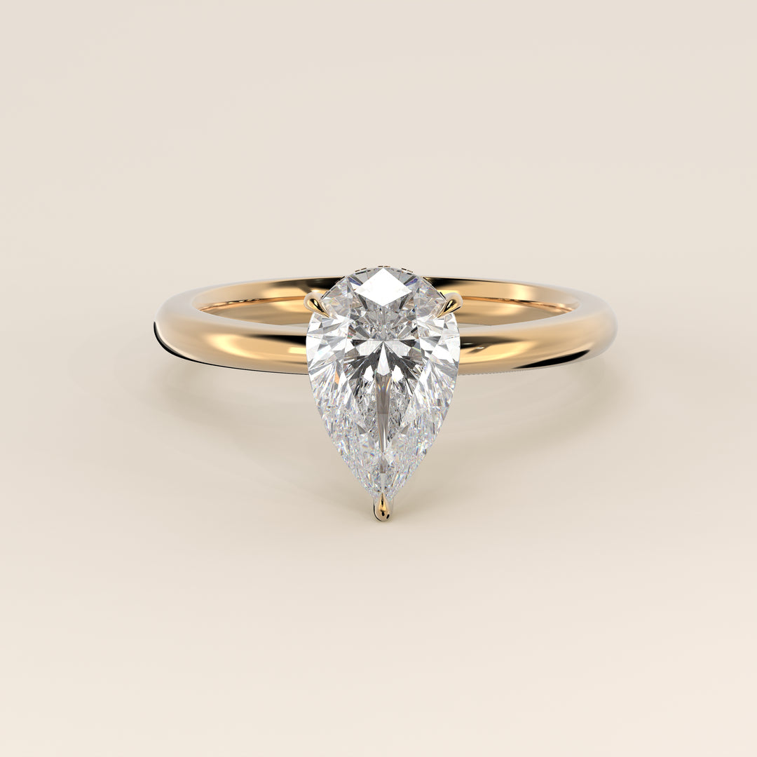 Verlobungsring mit birnenförmigem, im Labor gezüchtetem Diamanten und verstecktem Halo, Gelbgold