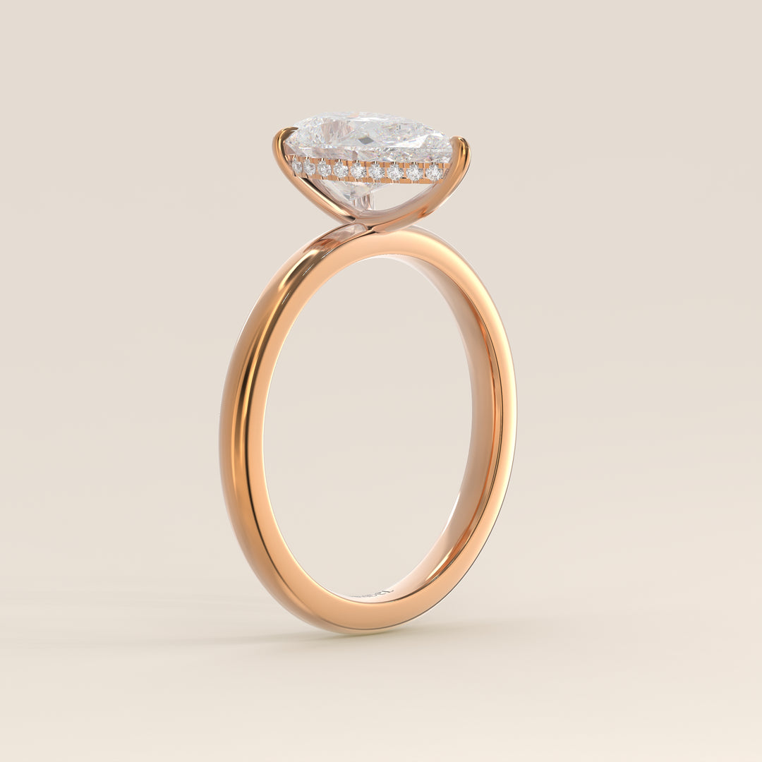 Verlobungsring mit birnenförmigem, im Labor gezüchtetem Diamanten und verstecktem Halo, Roségold