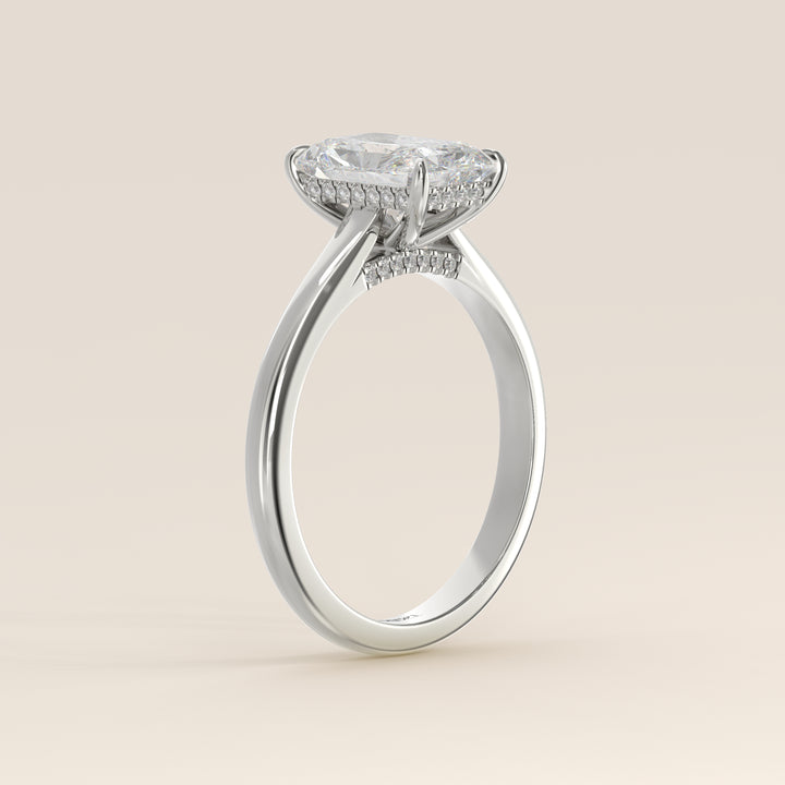 Verlovingsring radiant lab grown diamant met cathedral setting, hidden halo en diamond bridge, witgoud