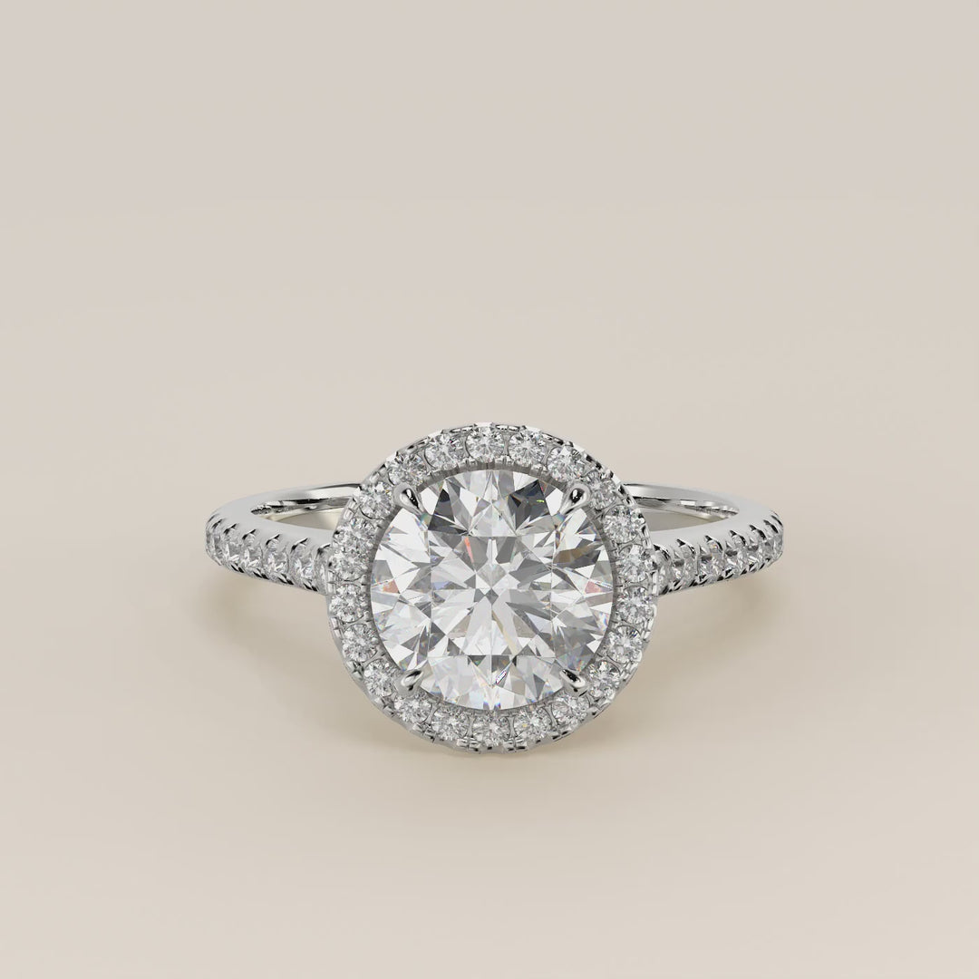 Verlovingsring rond lab grown diamant met halo en pave band, witgoud