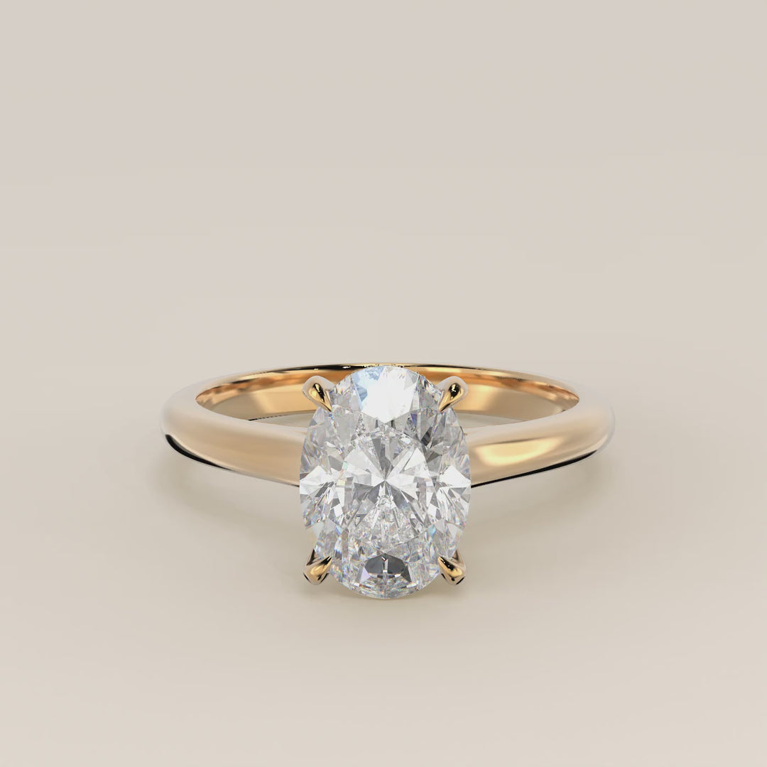 Verlovingsring ovaal lab grown diamant met cathedral setting en hidden halo, geelgoud