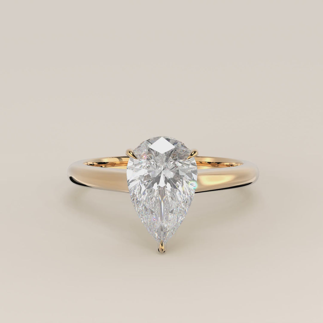 Verlovingsring peer lab grown diamant met cathedral setting, hidden halo en diamond bridge, geelgoud
