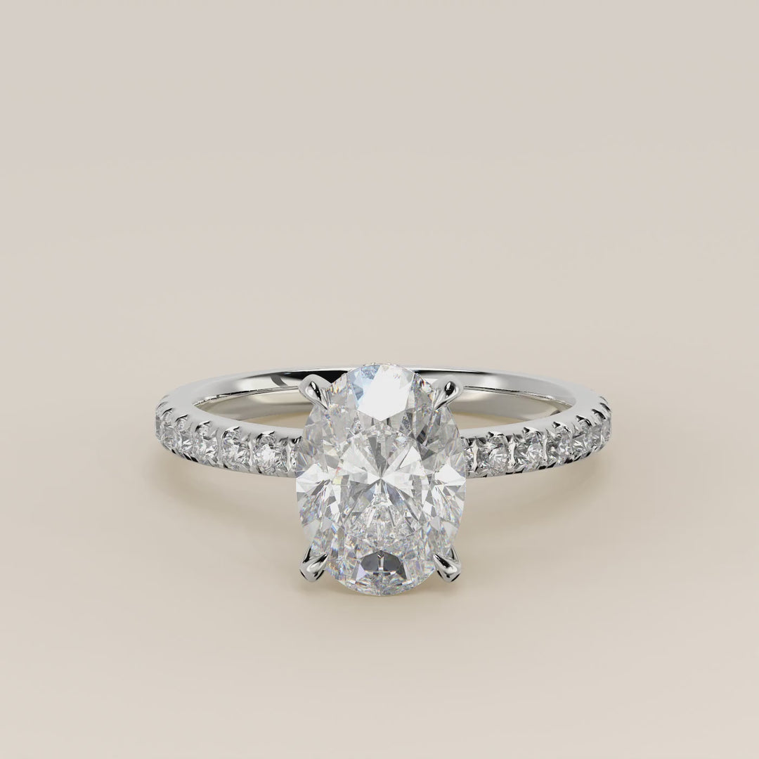 Verlovingsring ovaal lab grown diamant met hidden halo en pave band, witgoud