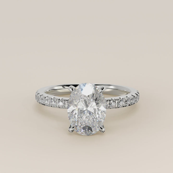 Verlovingsring ovaal lab grown diamant met hidden halo en pave band, witgoud