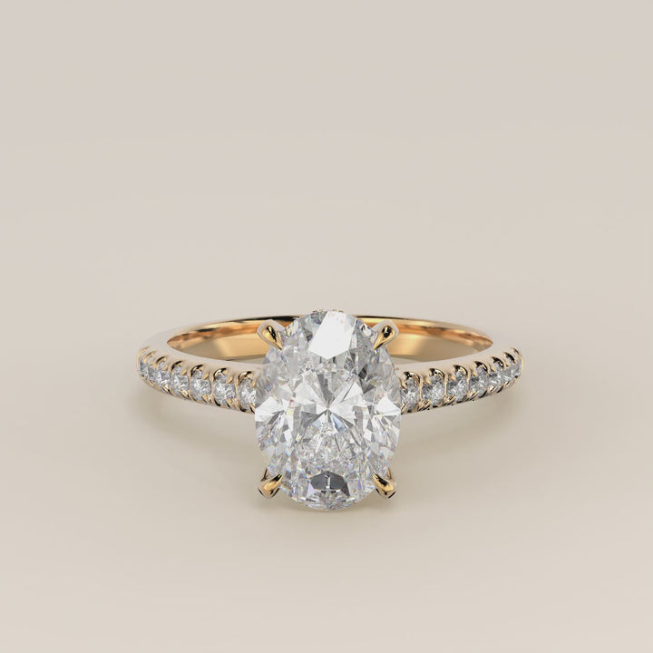 Verlovingsring ovaal lab grown diamant met pave band, hidden halo en diamond bridge, geelgoud