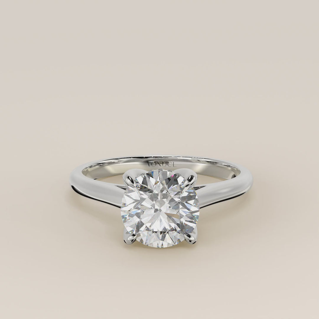 Verlovingsring rond lab grown diamant met petal prongs en hidden halo, witgoud
