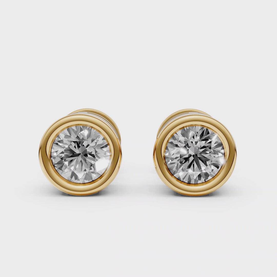 Rond Briljant Bezel Stud Oorbellen - 18K Geelgoud - 1,07 ct