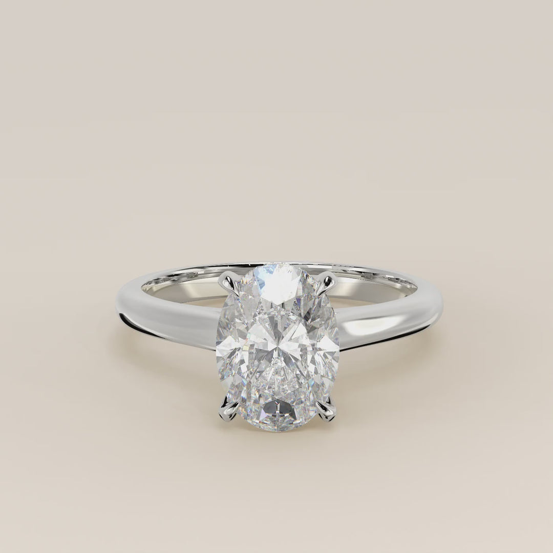 Verlovingsring ovaal lab grown diamant met cathedral setting en hidden halo, witgoud
