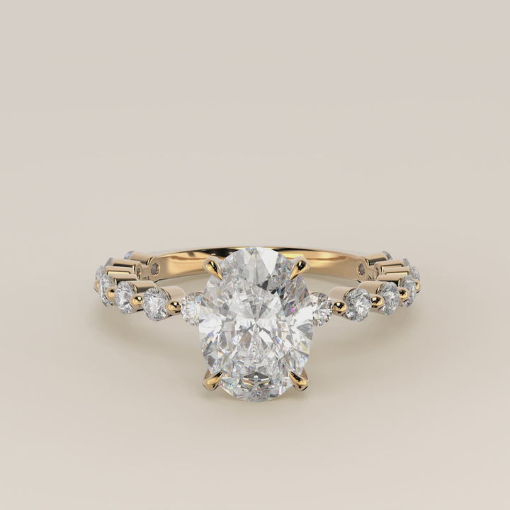 Verlovingsring ovaal lab grown diamant met ronde diamanten band, geelgoud