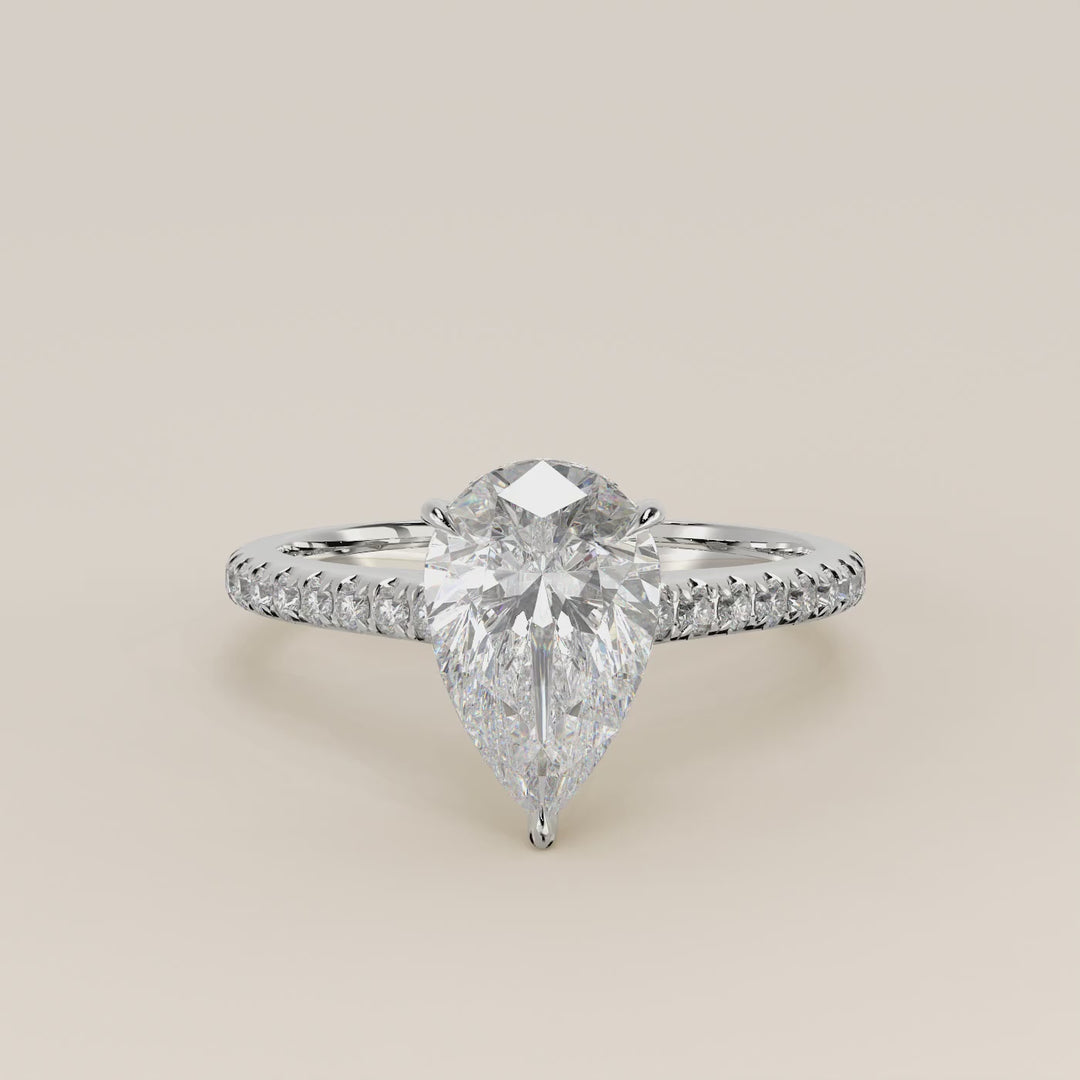 Verlovingsring peer lab grown diamant met cathedral zetting, pave band en hidden halo, witgoud
