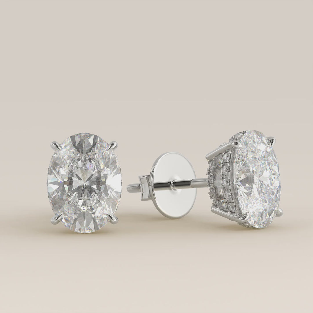 Ovaal lab grown diamanten stud oorbellen met dubbele hidden halo en basket setting, witgoud