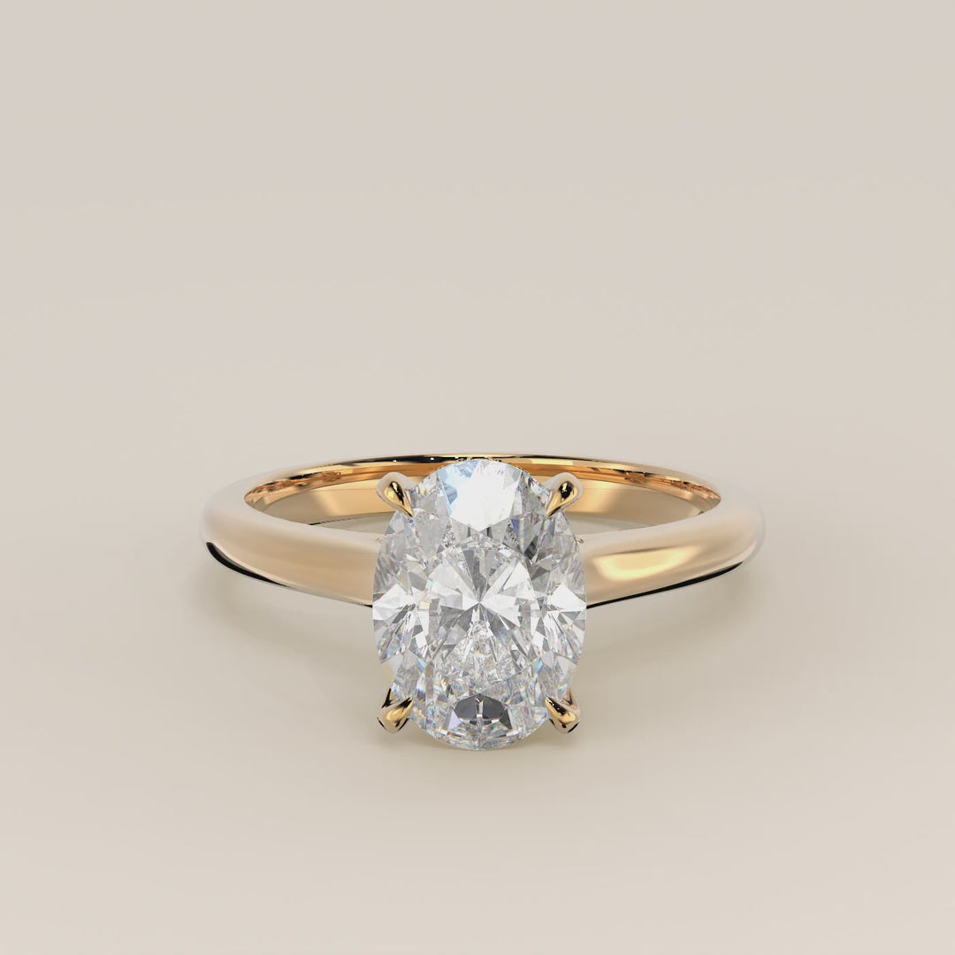 Verlovingsring ovaal lab grown diamant met cathedral setting, hidden halo en diamond bridge, geelgoud