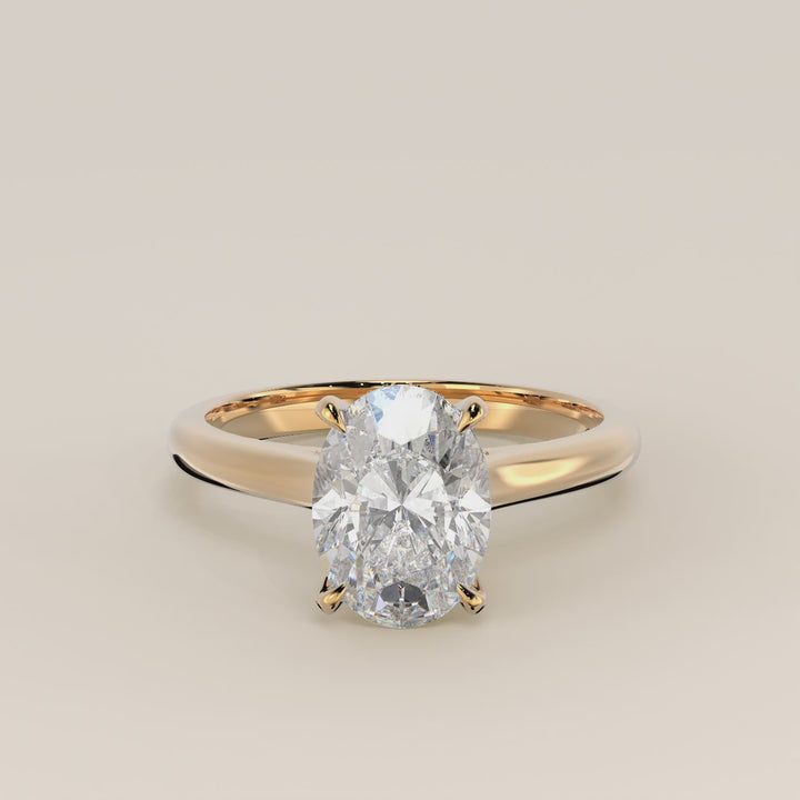 Verlovingsring ovaal lab grown diamant met cathedral setting, hidden halo en diamond bridge, geelgoud