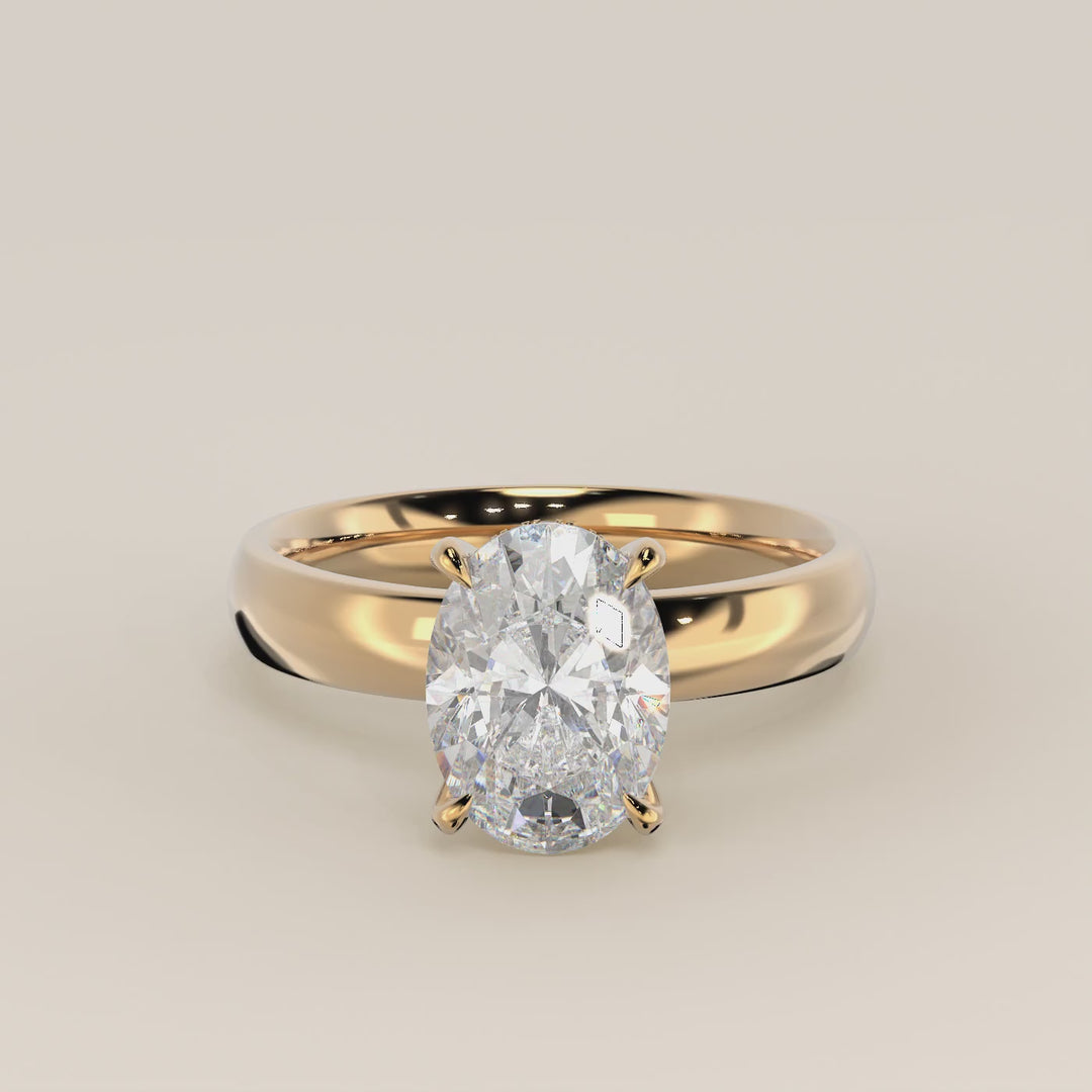 Verlovingsring ovaal lab grown diamant met brede band en hidden halo, geelgoud