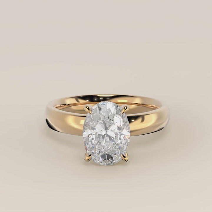 Verlovingsring ovaal lab grown diamant met brede band en hidden halo, geelgoud