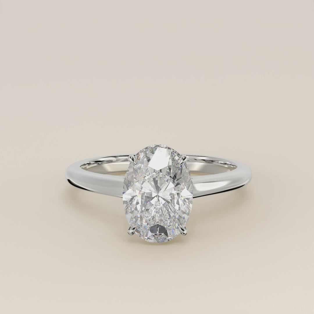 Mikki - Oval Solitair Lab Grown Diamond Ring with Cathedral Setting and Wrap Around Halo