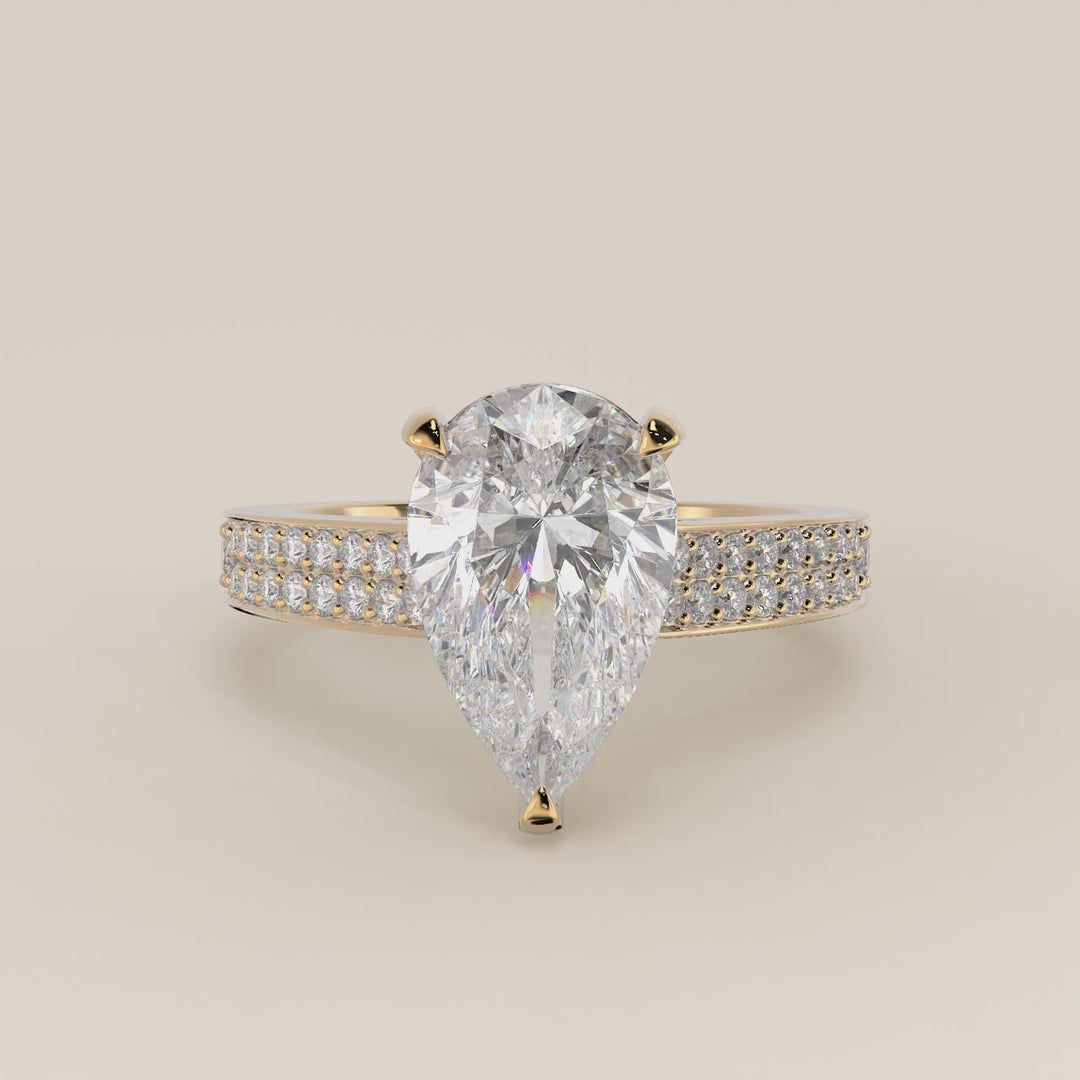 Verlovingsring peer lab grown diamant met brede pave band, cathedral setting en hidden halo, geelgoud