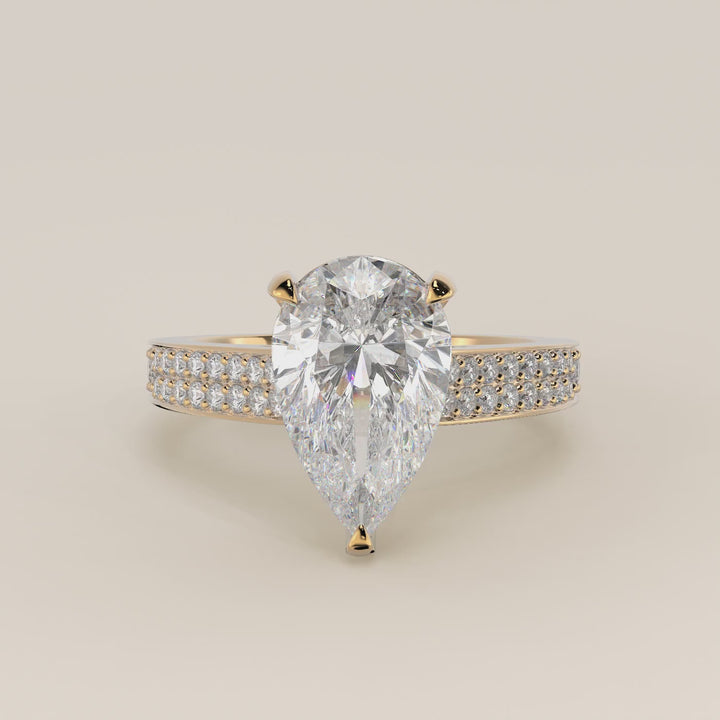 Verlovingsring peer lab grown diamant met brede pave band, cathedral setting en hidden halo, geelgoud