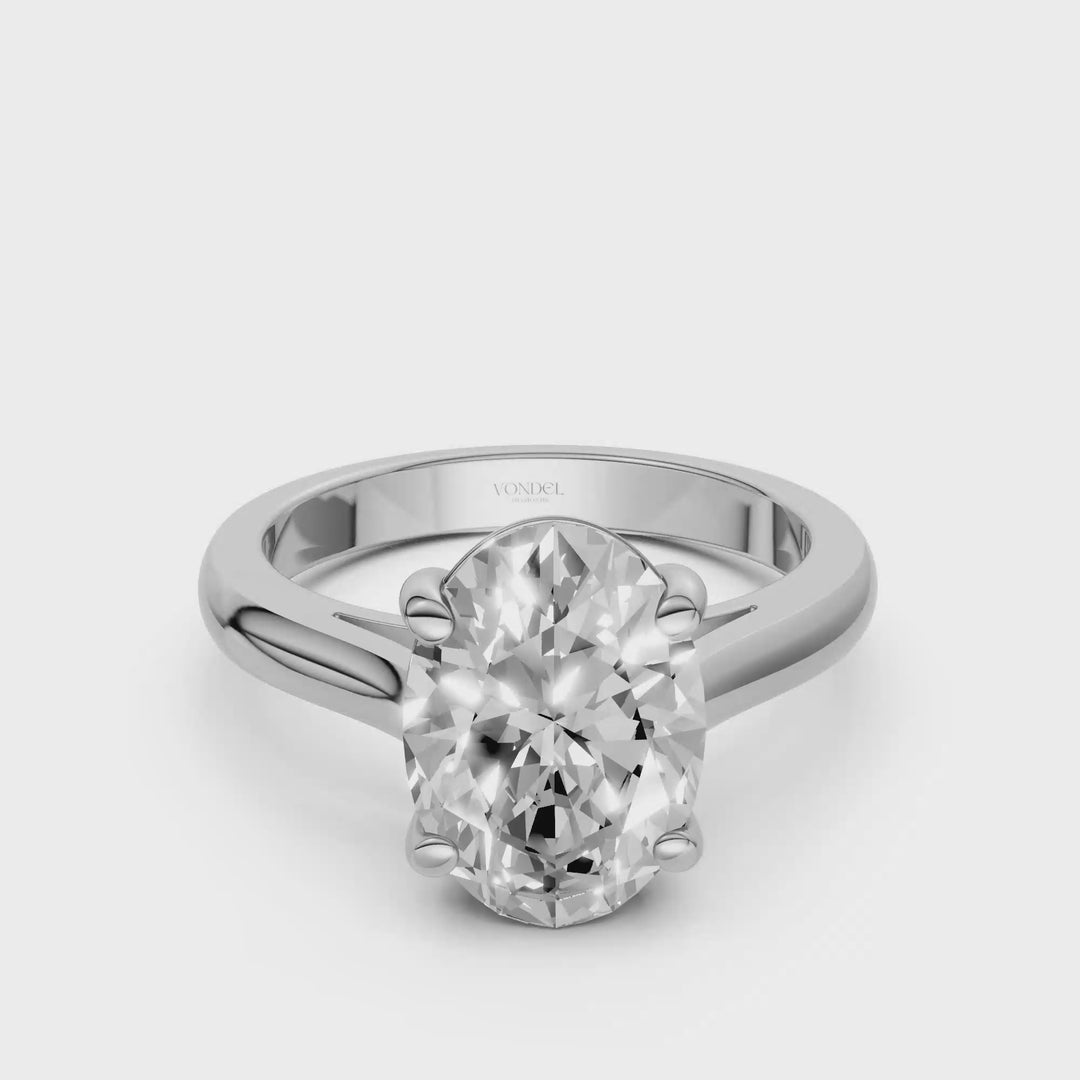 Oval Solitair Ring Met Cathedral Zetting