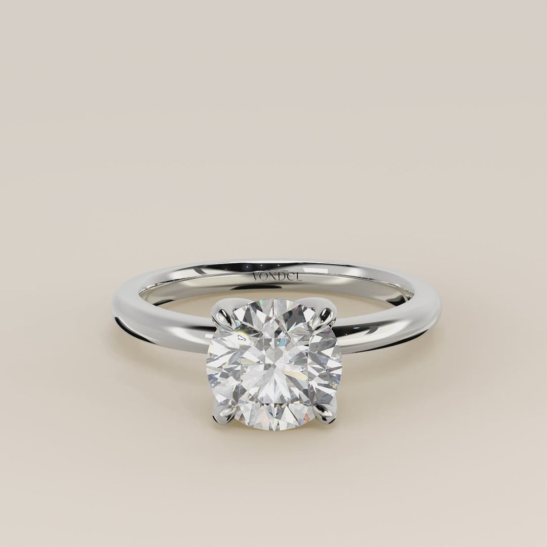 Verlovingsring rond lab grown diamant met petal prongs, witgoud