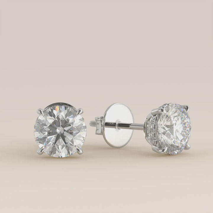 Stud oorbellen rond lab grown diamant met hidden halo, witgoud