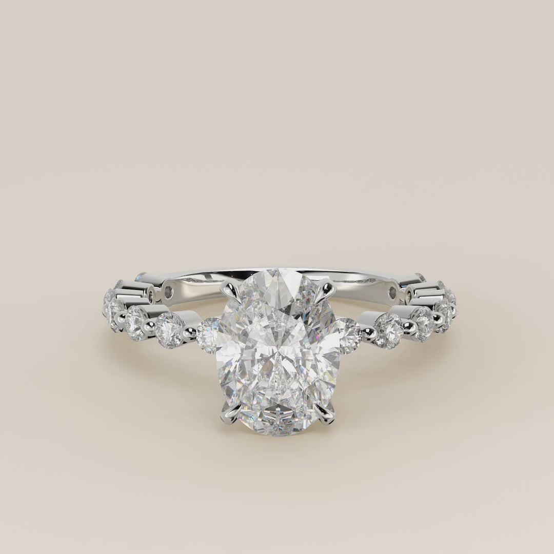 Verlovingsring ovaal lab grown diamant met ronde diamanten band, witgoud