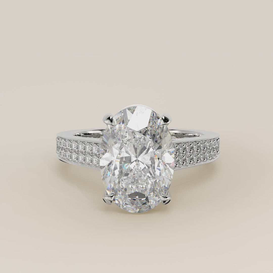Verlovingsring ovaal lab grown diamant met brede pave band, cathedral setting en hidden halo, witgoud